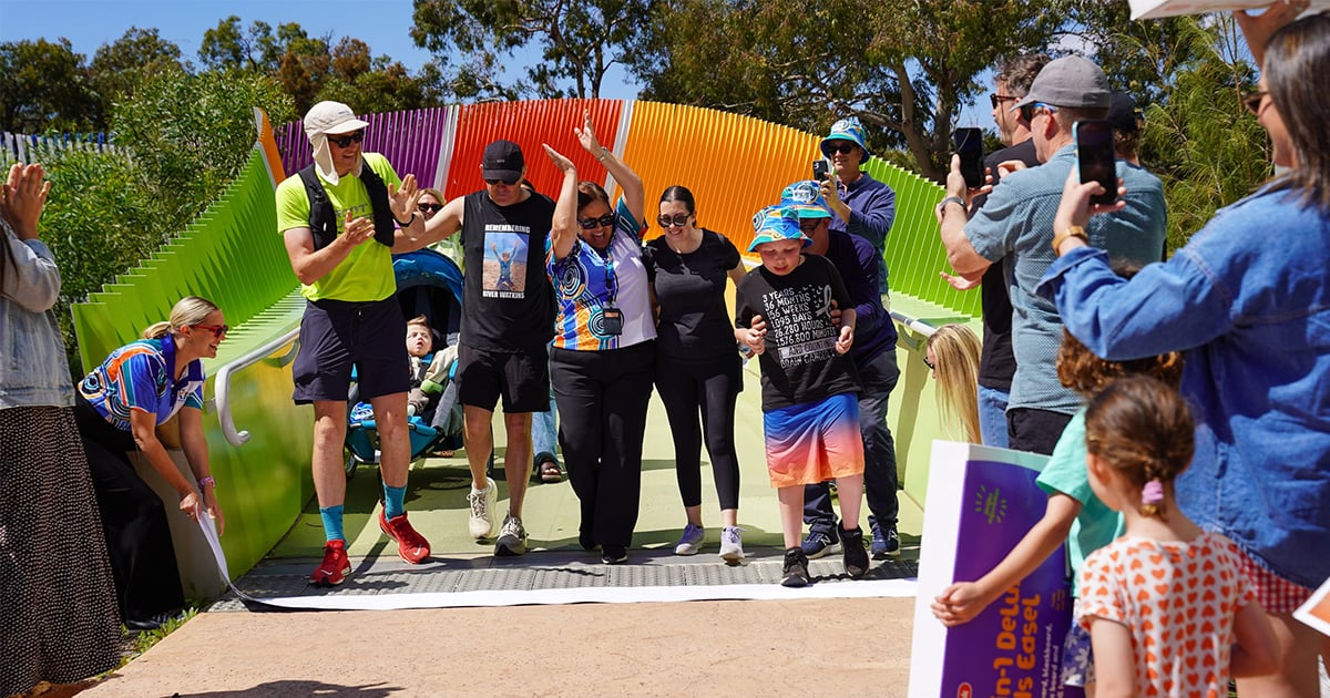 jacob byrne at the finish line of his final marathon